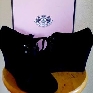 Juicy Couture black faux fur lined, wedge ankle booties.